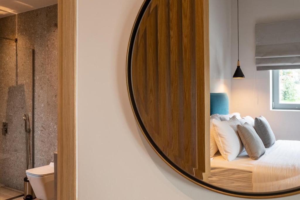 Posteľ alebo postele v izbe v ubytovaní Linari Villas