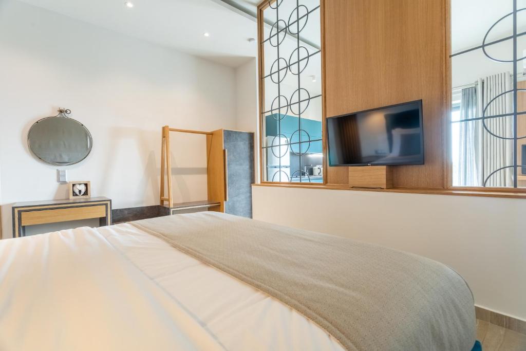 Posteľ alebo postele v izbe v ubytovaní Linari Villas