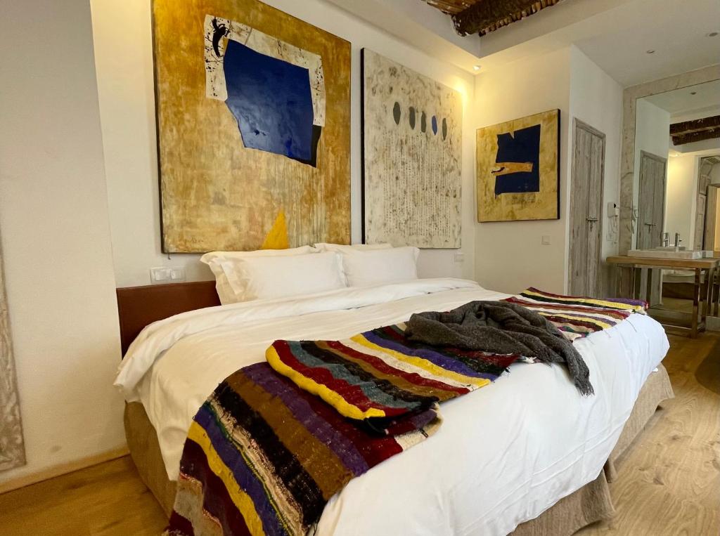 Postel nebo postele na pokoji v ubytování BCK Art Riad