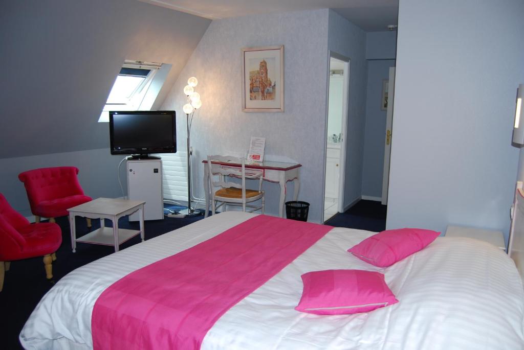 Postel nebo postele na pokoji v ubytování Hotel Biney