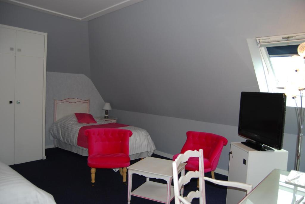 Postel nebo postele na pokoji v ubytování Hotel Biney