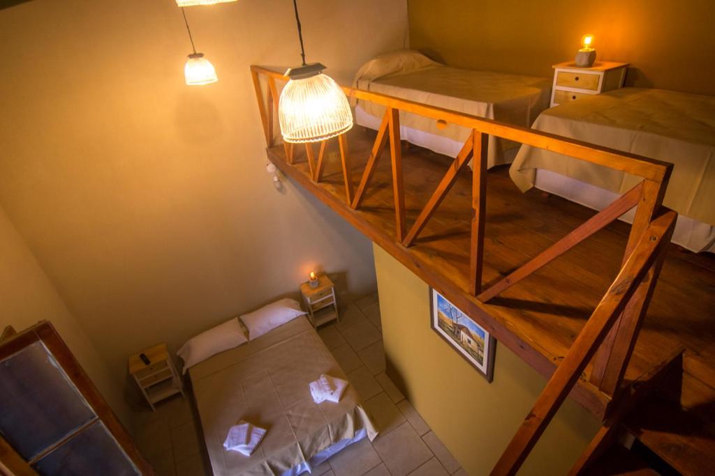an overhead view of a room with two bunk beds at Solar del Río in Esquina