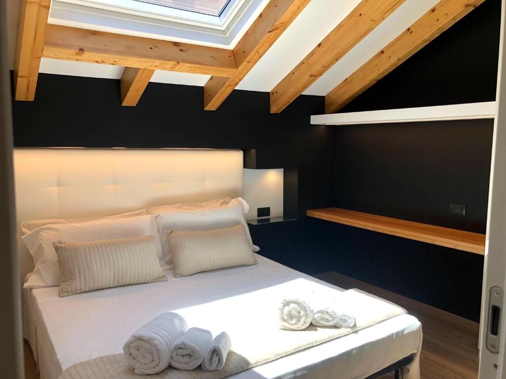 Łóżko lub łóżka w pokoju w obiekcie Ottomood House Catania