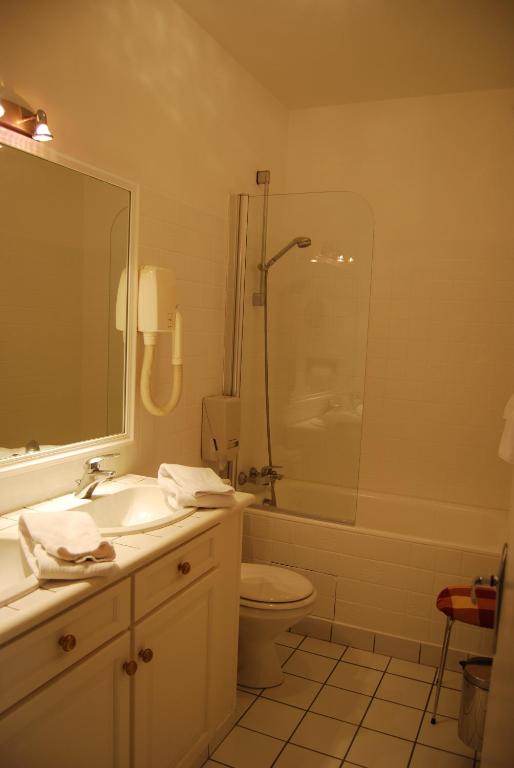 Koupelna v ubytování Hotel Biney