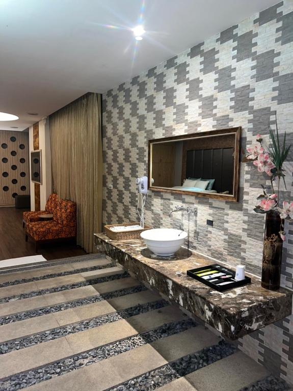 Koupelna v ubytování Her Home Spa Motel Douliu