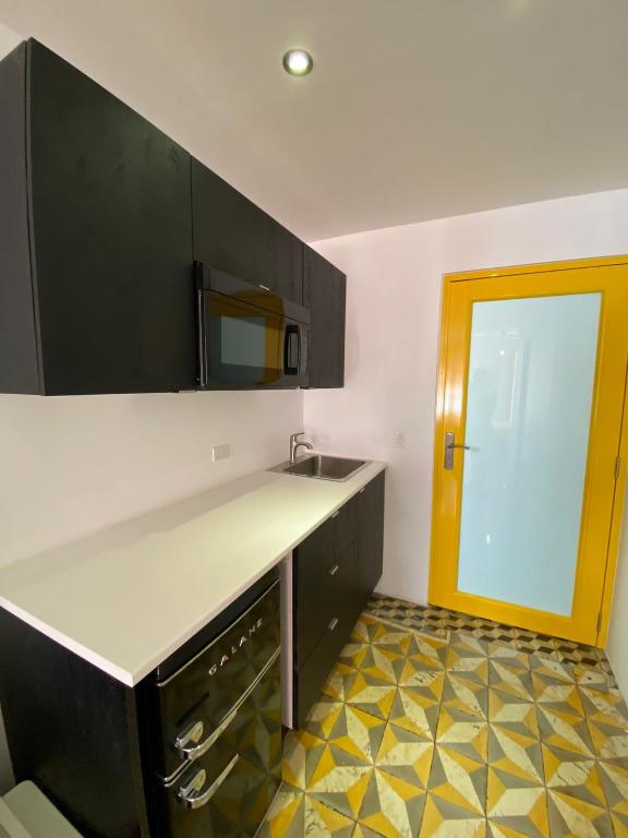 Kuchyň nebo kuchyňský kout v ubytování Hotel Nest