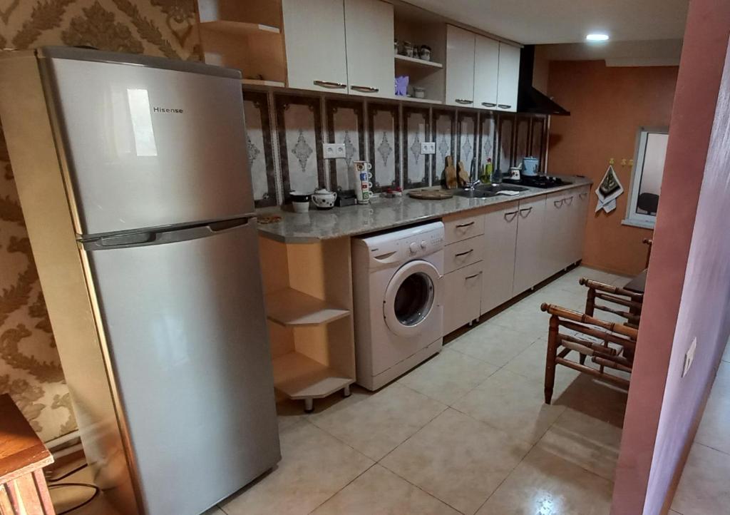 Kuchyň nebo kuchyňský kout v ubytování Dream House & Hostel