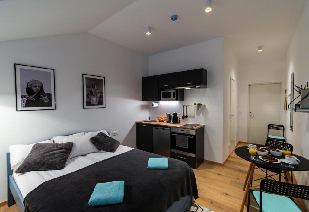 Kuchyň nebo kuchyňský kout v ubytování Apartments24 Spordi