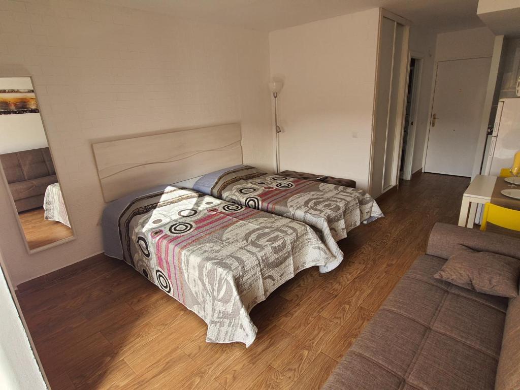 A bed or beds in a room at Beautiful Studio in Minerva