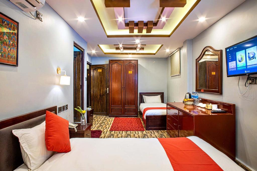 Postel nebo postele na pokoji v ubytování Hotel BnB Mhepi