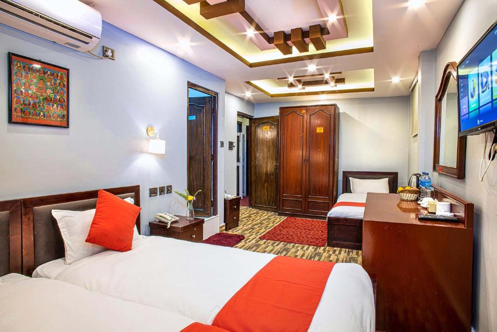 Postel nebo postele na pokoji v ubytování Hotel BnB Mhepi