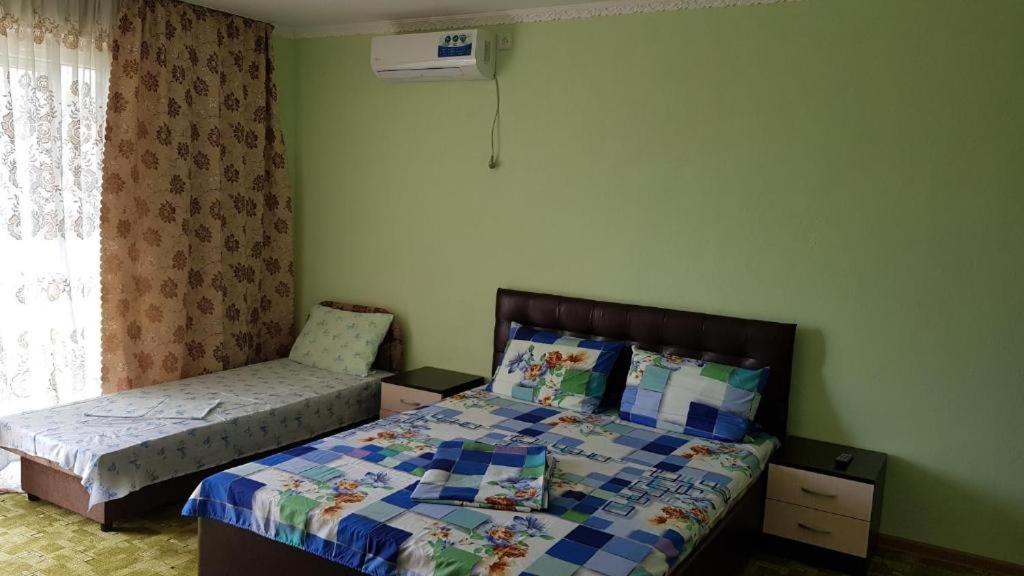 Säng eller sängar i ett rum på Guest House Afina