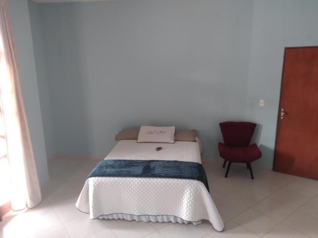 Postel nebo postele na pokoji v ubytování Pousada Emanuell
