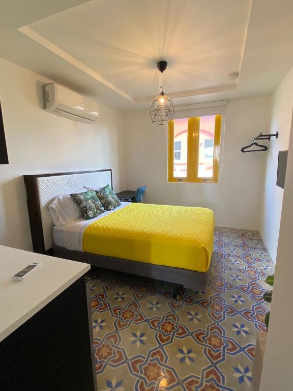 Postel nebo postele na pokoji v ubytování Hotel Nest