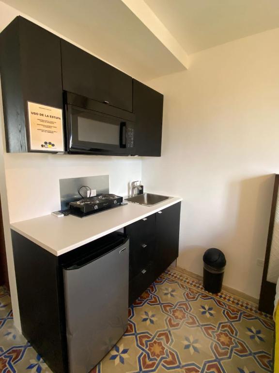 Kuchyň nebo kuchyňský kout v ubytování Hotel Nest