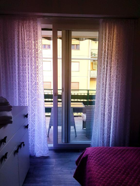 Łóżko lub łóżka w pokoju w obiekcie B&B Del Corso