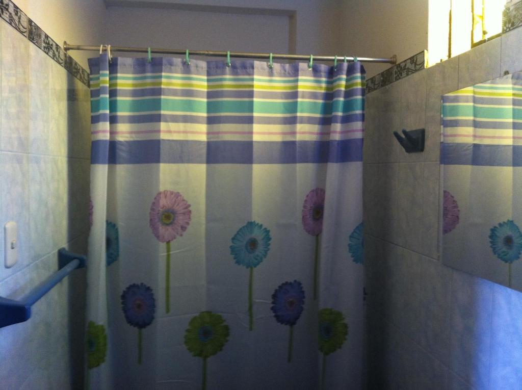 Koupelna v ubytování Hostal Tres Máscaras