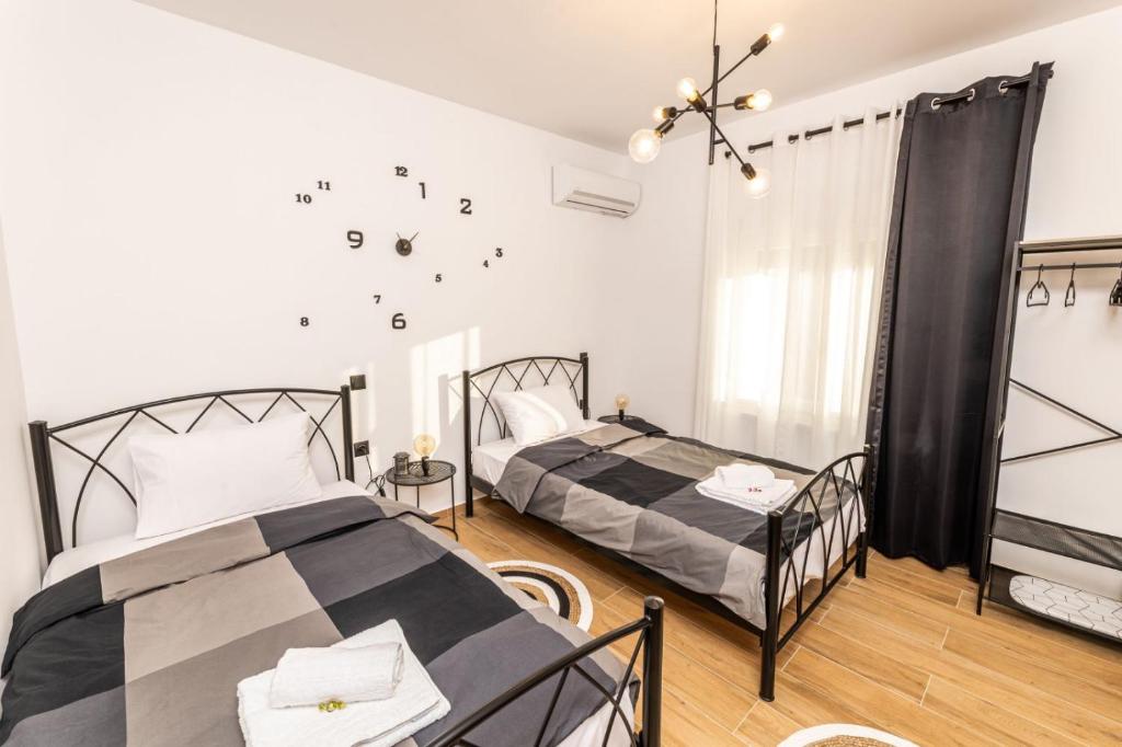 Postel nebo postele na pokoji v ubytování Welcome Home Meteora - Kalampaka!