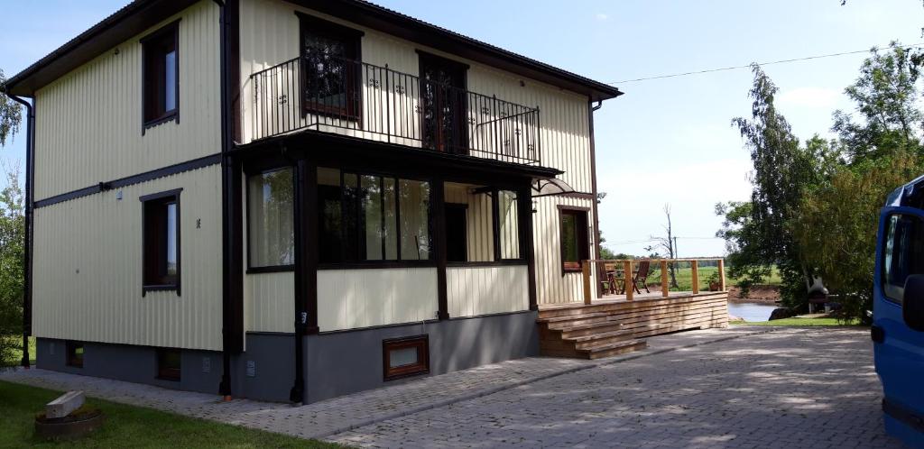 Holiday house by riverside with sauna and hottub