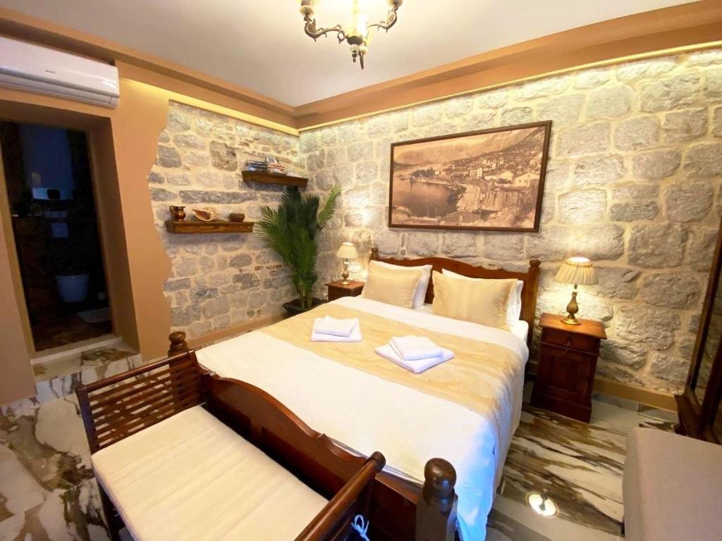 Postel nebo postele na pokoji v ubytování D & Sons Apartments