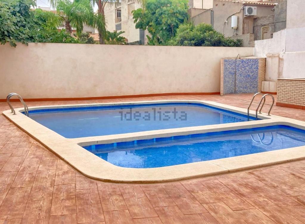 Apartamento con Piscina Terraza y Parking