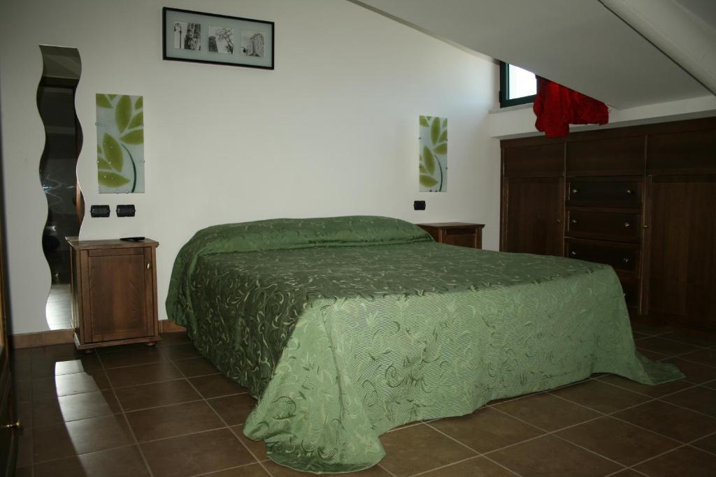 Postel nebo postele na pokoji v ubytování Hotel Miramare