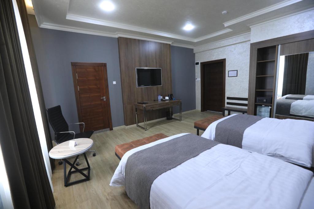 CHlNOR HOTEL - Quarto Twin Twin