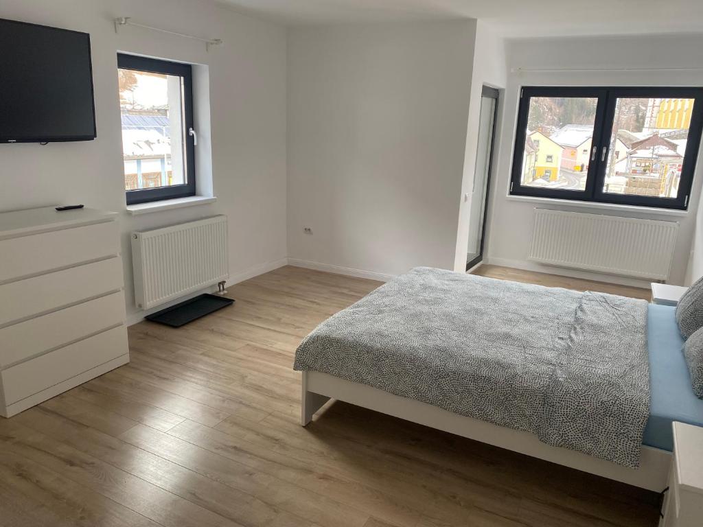 Posteľ alebo postele v izbe v ubytovaní Center House