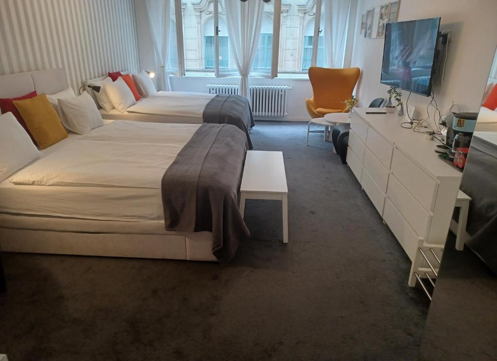 Televízia a/alebo spoločenská miestnosť v ubytovaní Apartment Penkala