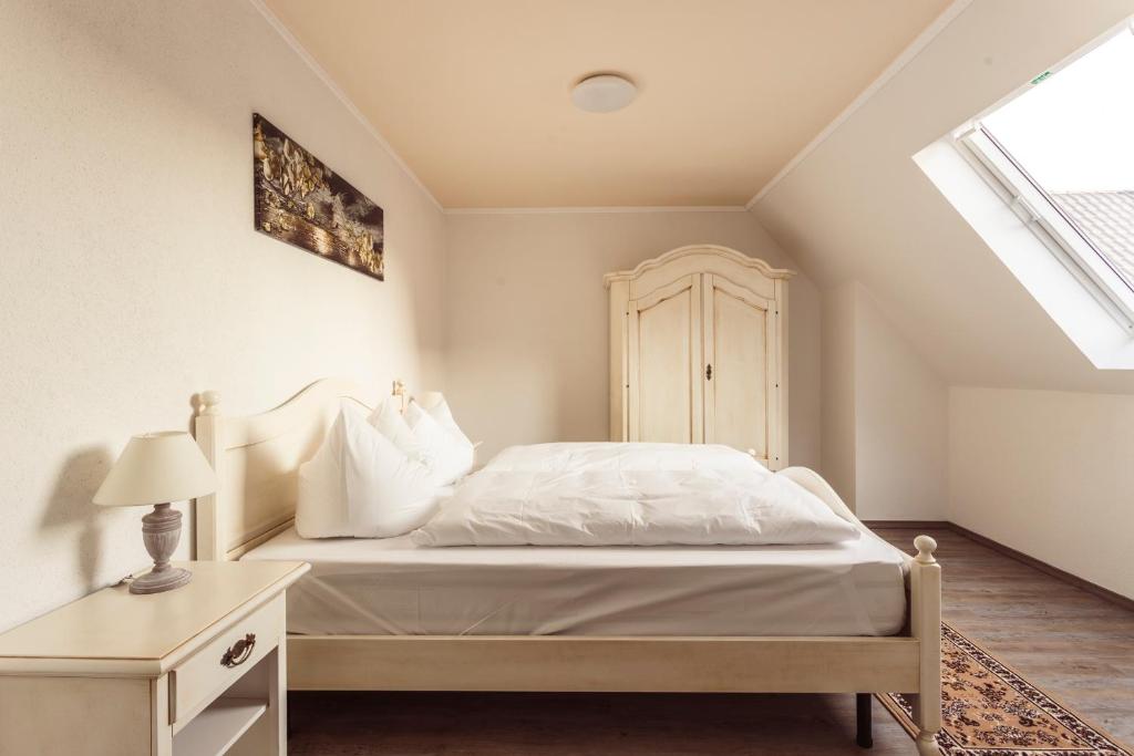 Postel nebo postele na pokoji v ubytování Hotel Roma