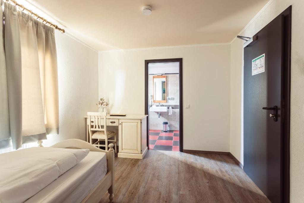 Postel nebo postele na pokoji v ubytování Hotel Roma