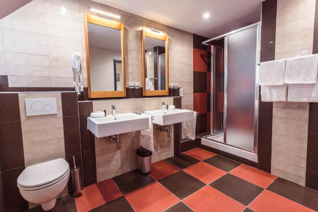 Koupelna v ubytování Hotel Roma