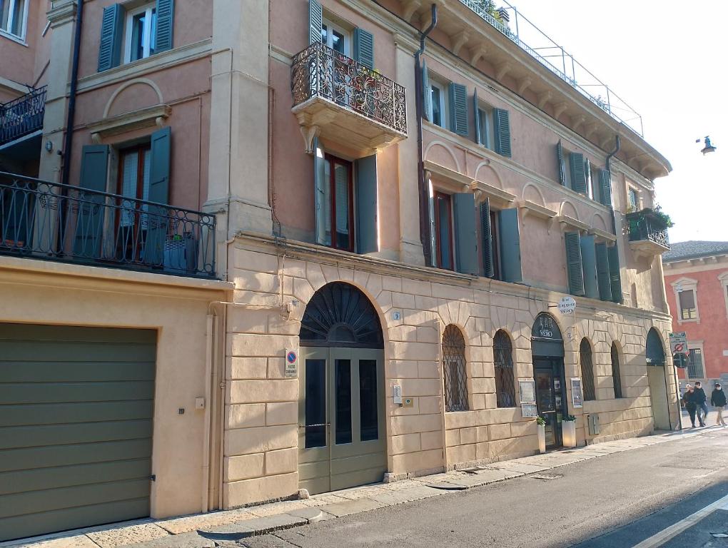 a building on the side of a street at B&B Ponte Manin in Verona