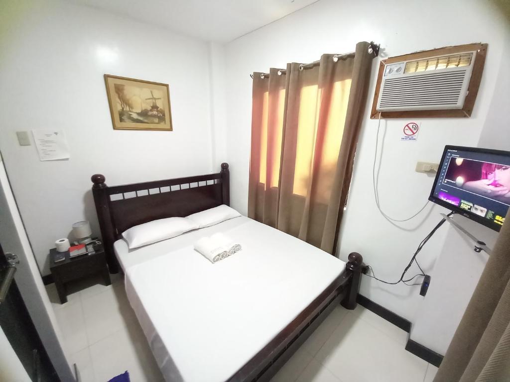 Postel nebo postele na pokoji v ubytování SOFIATEL Rooms