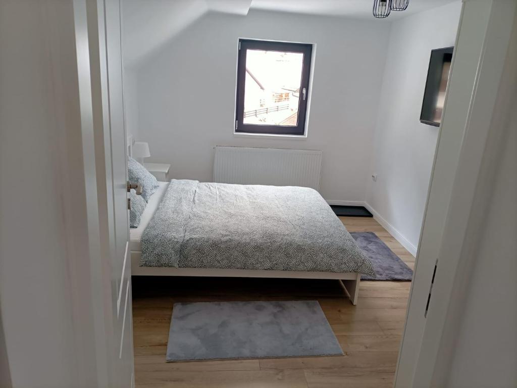 Posteľ alebo postele v izbe v ubytovaní Center House