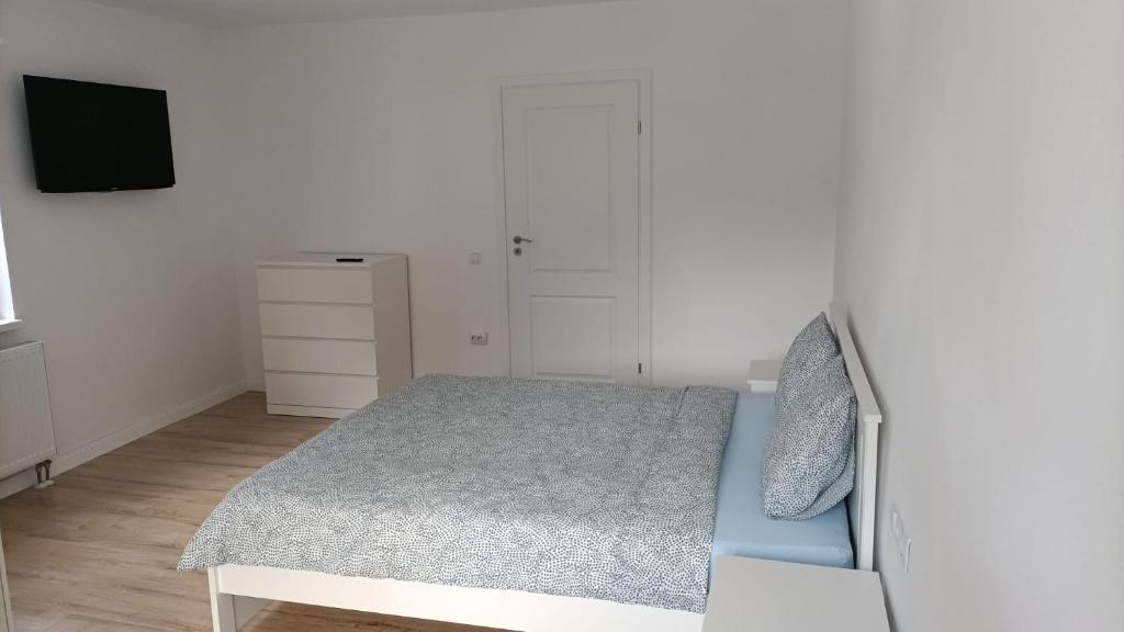 Posteľ alebo postele v izbe v ubytovaní Center House