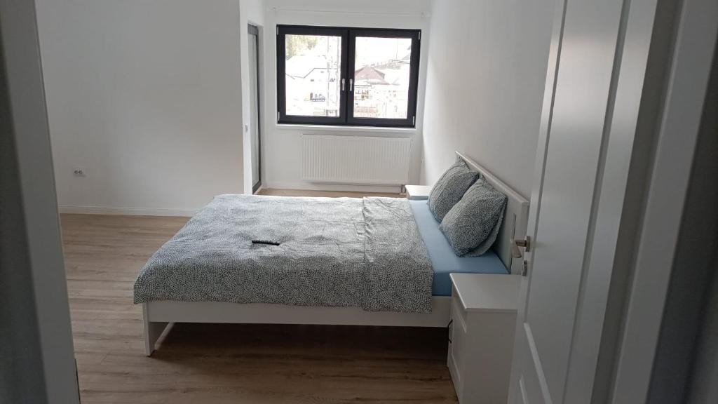 Posteľ alebo postele v izbe v ubytovaní Center House