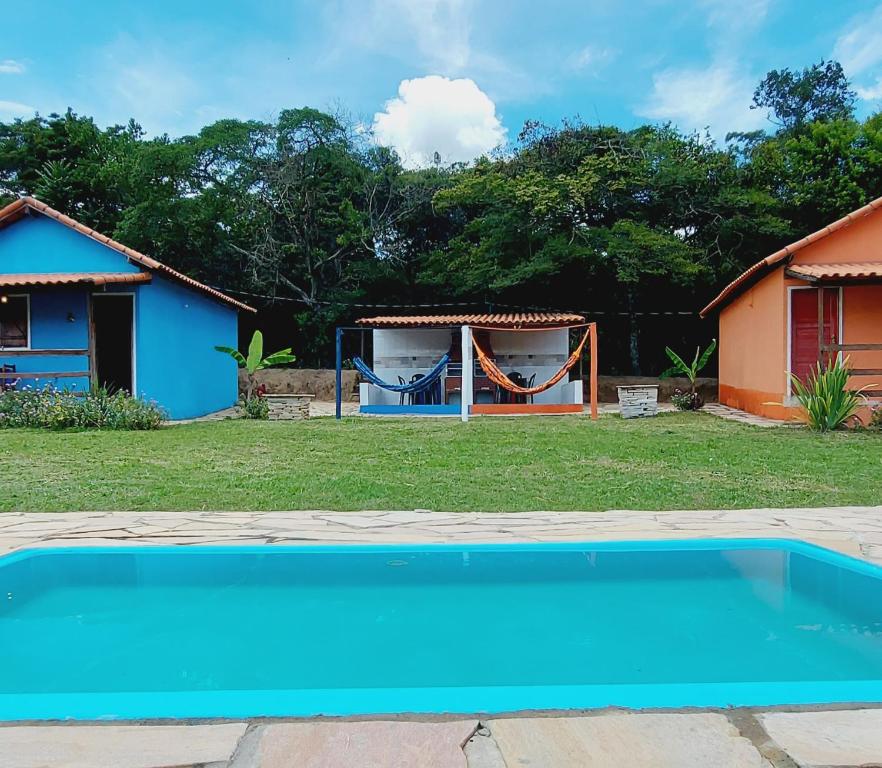 Bazén v ubytování Chalé Anjo Gabriel II em São Tomé das Letras nebo v jeho okolí