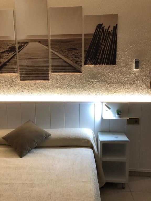 Postel nebo postele na pokoji v ubytování Hotel Claramar