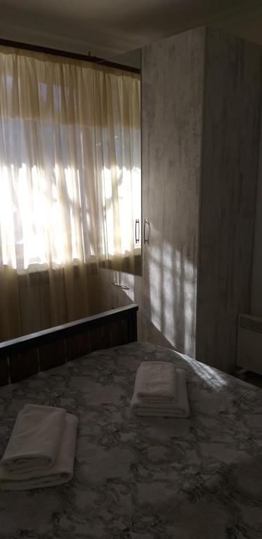 Postel nebo postele na pokoji v ubytování Arami Guest House