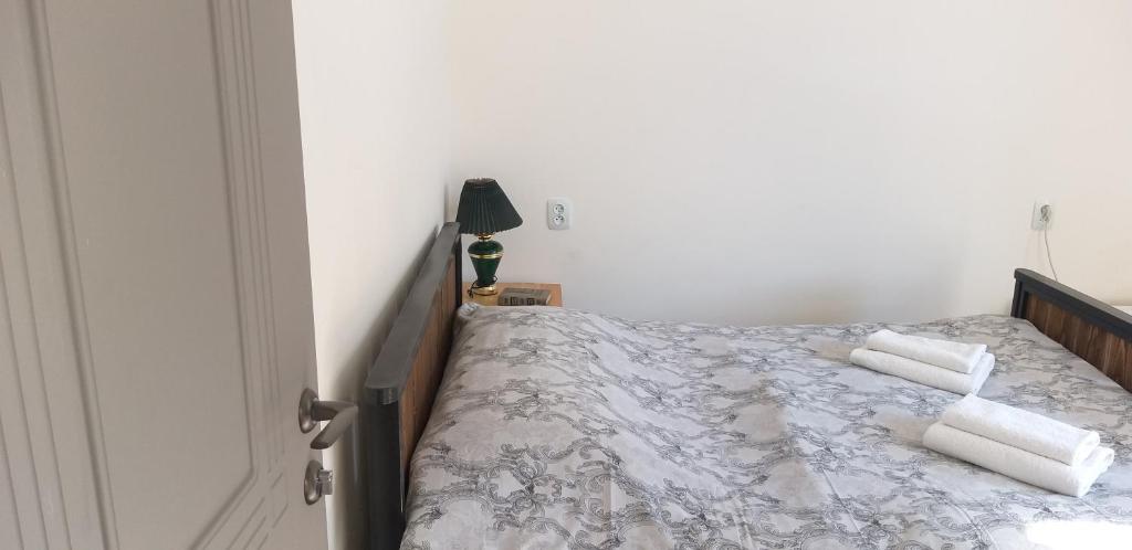 Postel nebo postele na pokoji v ubytování Arami Guest House