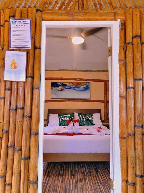 Postel nebo postele na pokoji v ubytování GEM Crystal Water Resort