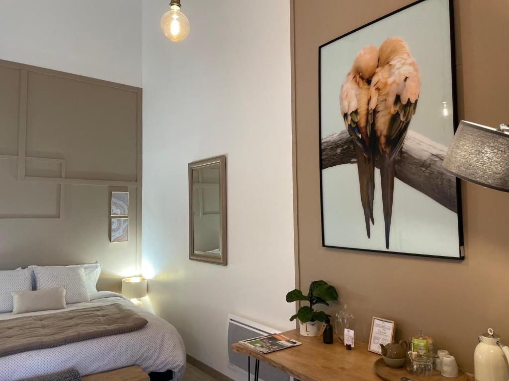 Postel nebo postele na pokoji v ubytování Chez Brunet chambres d'hôtes et gîte