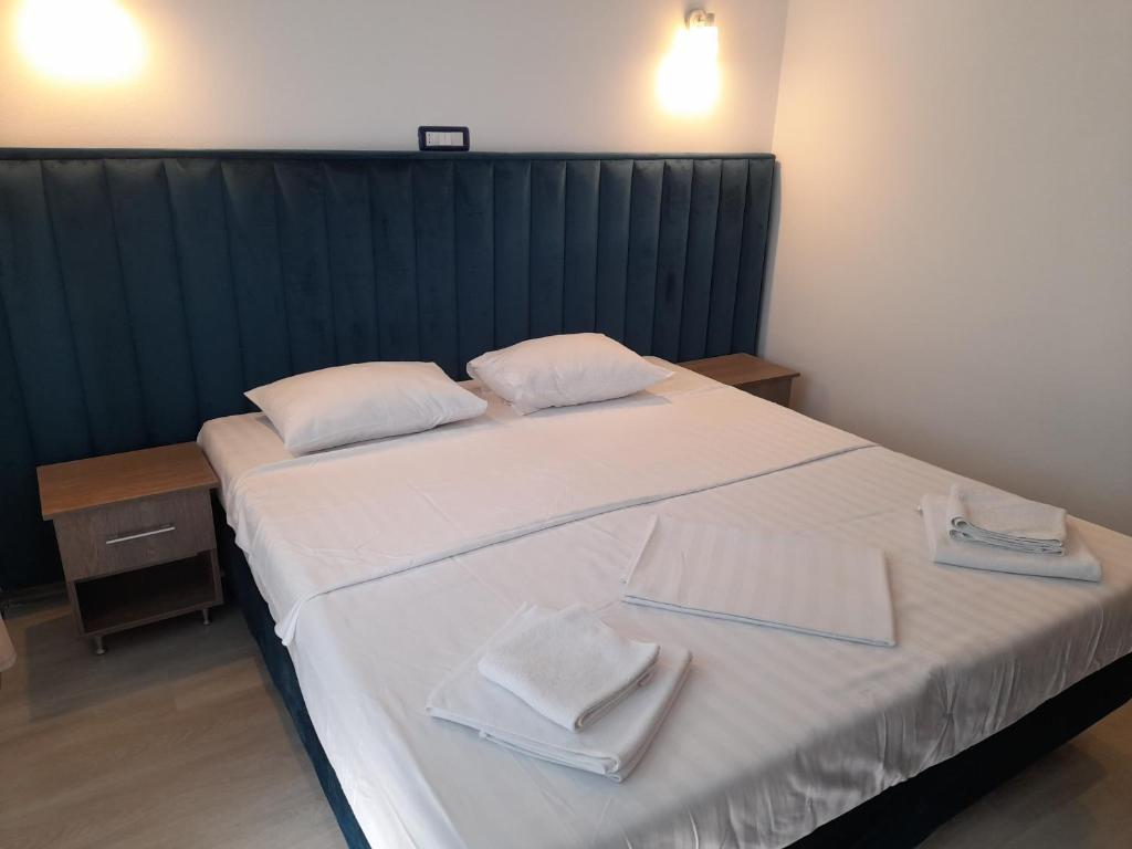 Postel nebo postele na pokoji v ubytování ADMAR Rooms & Restaurant