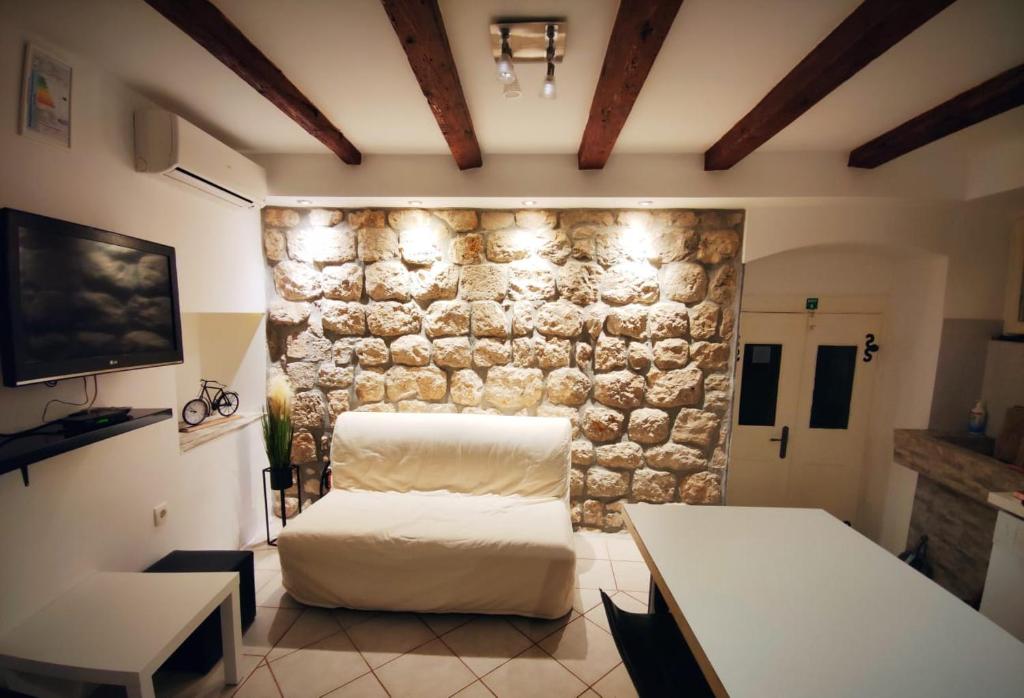 Ένα ή περισσότερα κρεβάτια σε δωμάτιο στο House Nina