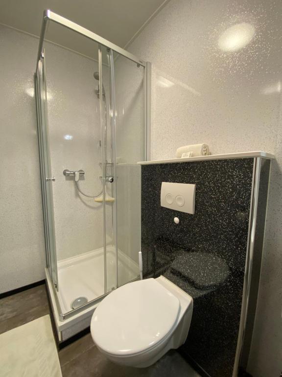 Koupelna v ubytování Hotel Schütz