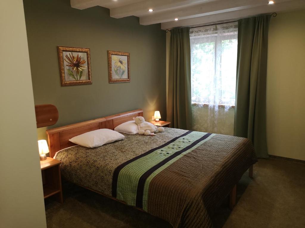 Postel nebo postele na pokoji v ubytování Hotel Senlīči