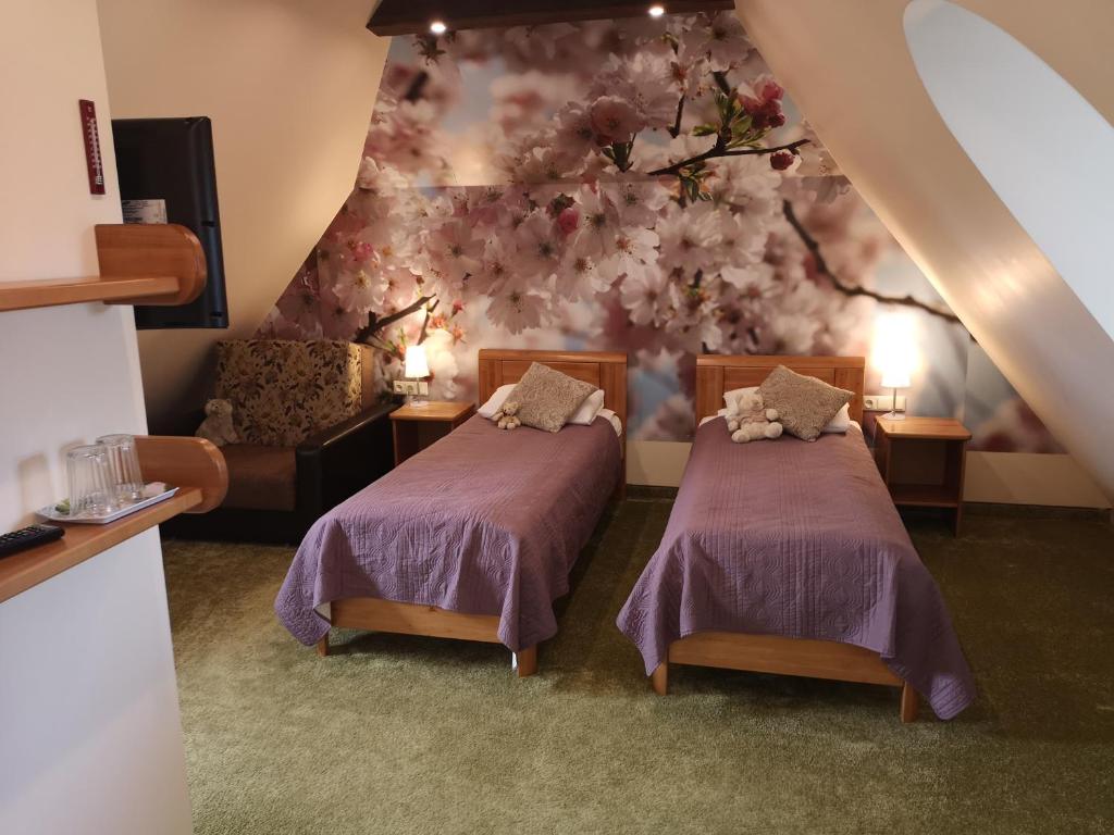 Postel nebo postele na pokoji v ubytování Hotel Senlīči