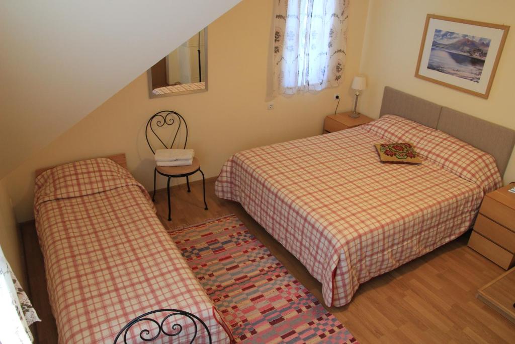 Postel nebo postele na pokoji v ubytování Peipsi Lake House