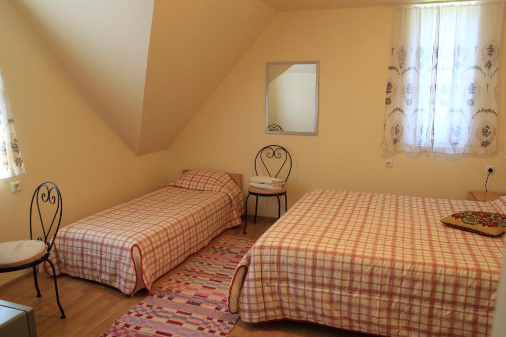Postel nebo postele na pokoji v ubytování Peipsi Lake House